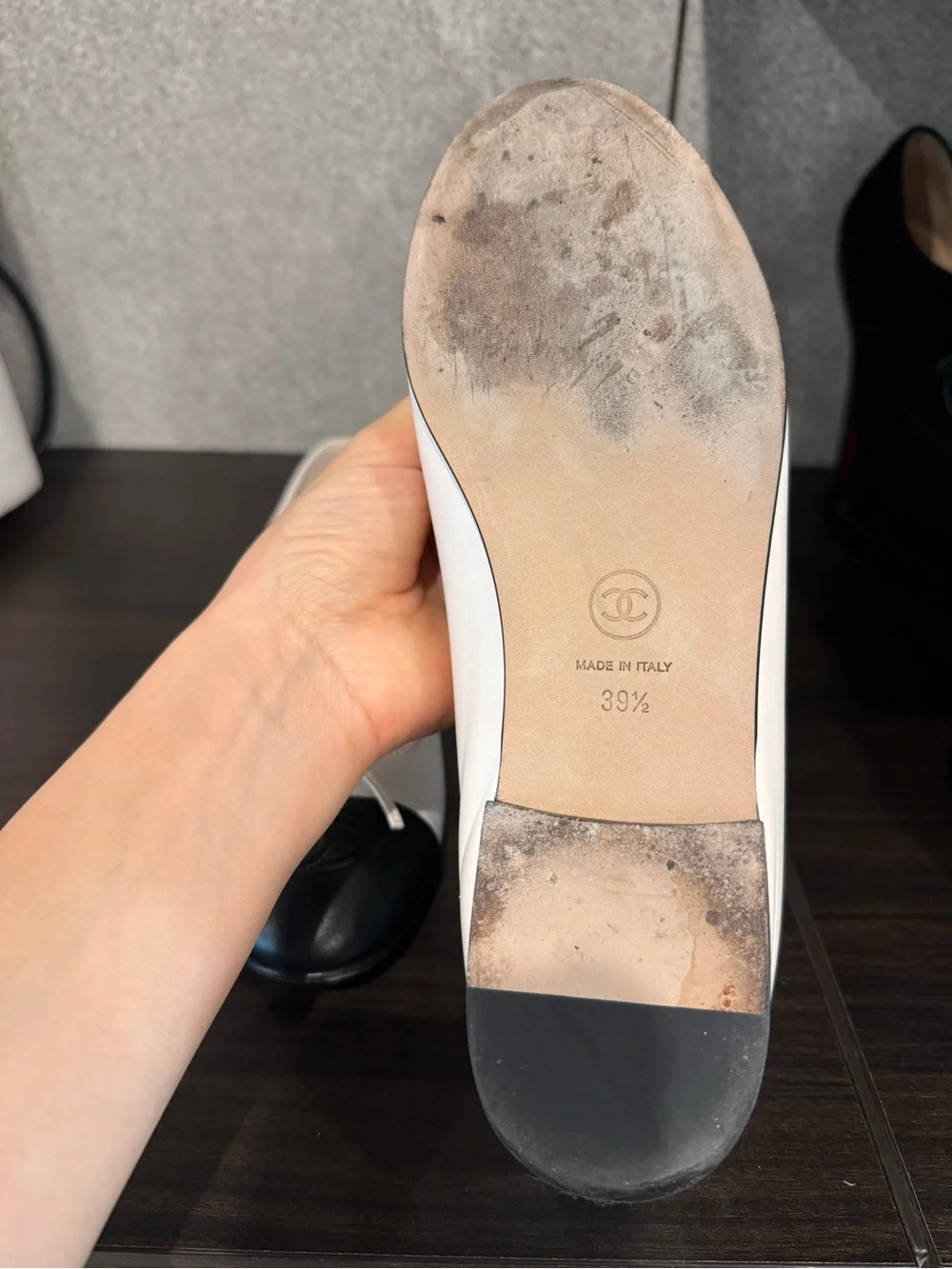 CHANEL Two-Tone Leather Cap-Toe Ballet Flats in White and Black